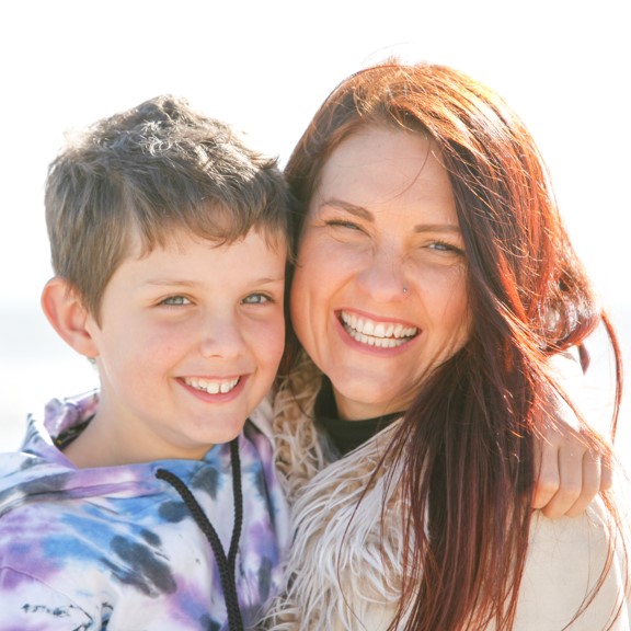 Mother and son hugging